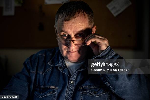 Alexander Cherkasov, chairman of the board of the main Russian human rights NGO Memorial, attends an interview with AFP in Moscow on March 12, 2021....