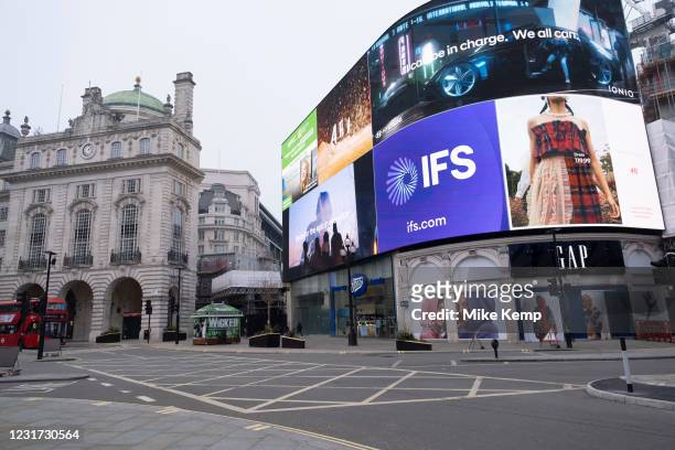 Empty scene at Piccadilly Circus where very few people or vehicles are out and about as the national coronavirus lockdown three continues on 3rd...