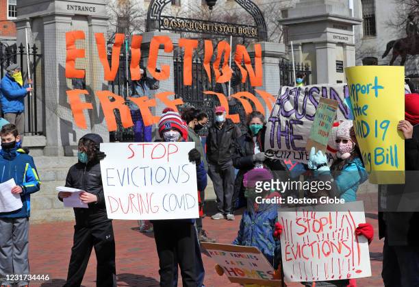 People and students from Worker's Circle of Boston and members of City Life Vida Urbana protest to rally support behind house bill HD3030, which...