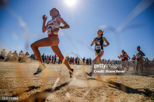 Alison Pray, Southern Utah and Jenna Magness of Michigan State cruise through a turn during the Division I Mens and Womens Cross Country...