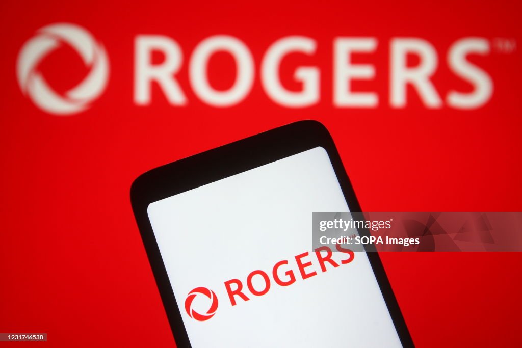 Rogers.com In this photo illustration, Rogers Communications logo of a Canadian ...