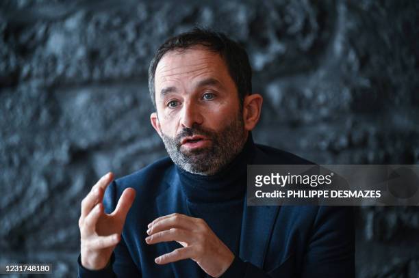 Former socialist minister and founder of Generation.s movement Benoit Hamon speaks during candidate EELV for the regional elections Fabienne...