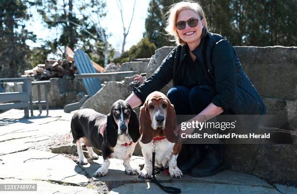 Beth Herriman designs and sells the dooloop inspired by her own basset hounds, Angie, left, and Bella Friday, March 12, 2021.