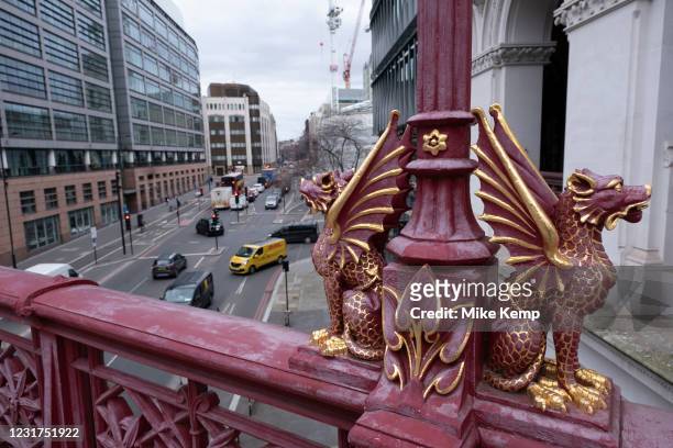 Red and gold dragons sit on the opposite side of the City of London dragon boundary mark at Holborn Viaduct on 5th March 2021 in London, United...