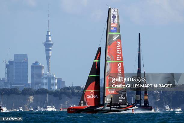 Luna Rossa Prada Pirelli competes against Emirates Team New Zealand during race ten on day seven of the 36th America's Cup in Auckland on March 17,...