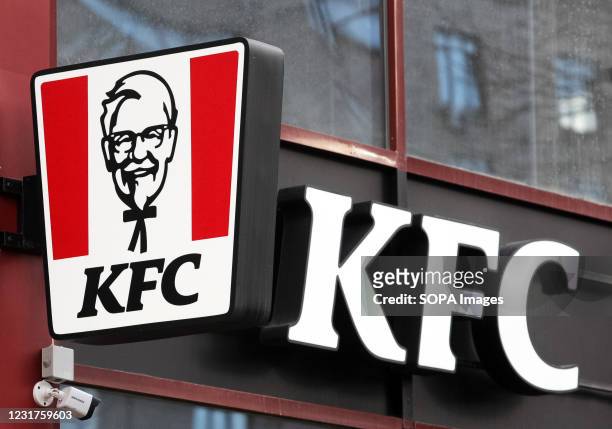 Logo of the US fast food restaurant chain seen over the entrance to a KFC restaurant in Kiev.