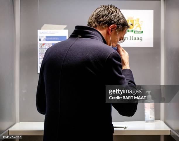 Dutch VVD's incumbent Prime Minister Mark Rutte arrives to cast his vote in the 2021 Dutch general elections in the primary school De Schoolteachers...
