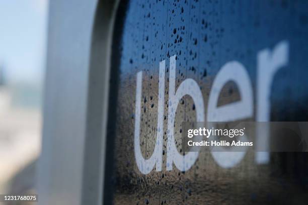 General view of the Uber logo on March 17, 2021 in London, England. Uber has agreed to classify its British drivers as workers.