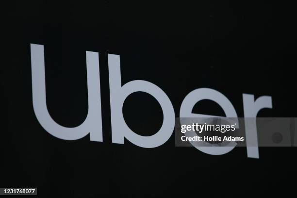 General view of the Uber logo on March 17, 2021 in London, England. Uber has agreed to classify its British drivers as workers.