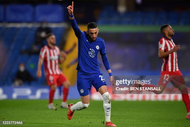 Chelsea's Moroccan midfielder Hakim Ziyech celebrates scoring his team's first goal during the UEFA Champions League round of 16 second leg football...