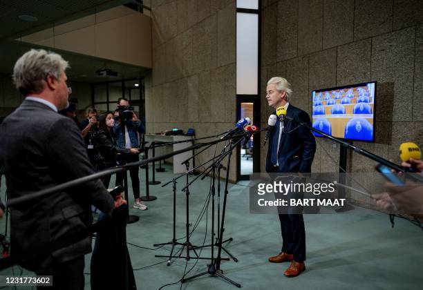 Dutch far-right party PVV leader Geert Wilders answers journalists' questions on the results of the Netherlands' general elections in the House of...