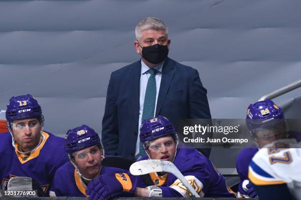 Todd McLellan head coach of the Los Angeles Kings looks on during the first period against the St. Louis Blues at STAPLES Center on March 17, 2021 in...