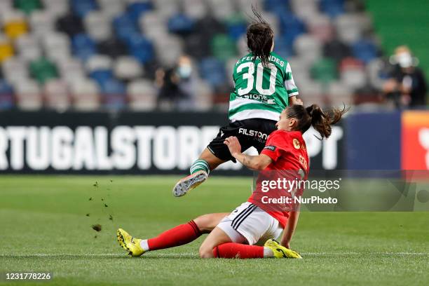 Ana Seia tacles Raquel Fernandes during the Womens Taa da Liga Final between Sporting CP and Sl Benfica FC at Estdio Magalhes Pessoa, Leiria,...