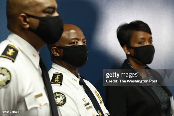 Atlanta Police Departments Deputy Chief Charles Hampton, Chief Rodney Bryant and Atlanta Mayor Keisha Lance Bottom attend a press conference for the...