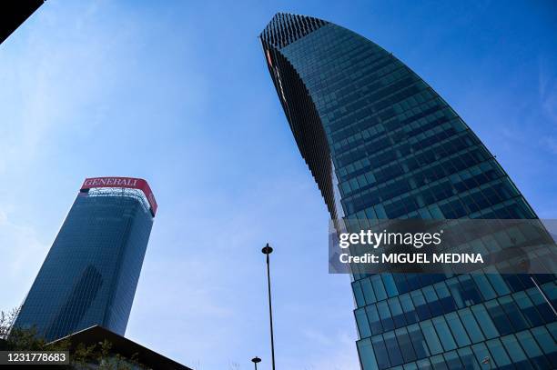 Picture taken on March 12, 2021 shows the Generali Tower and the Libeskind Tower , also known as the PwC Tower, in the City Life business district of...