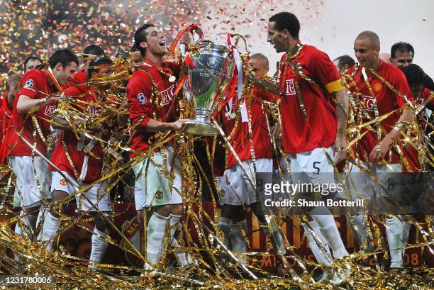 Cristiano Ronaldo and Rio Ferdinand of Manchester United celebrate with team-mates and the trophy following their team''s victory during the UEFA...