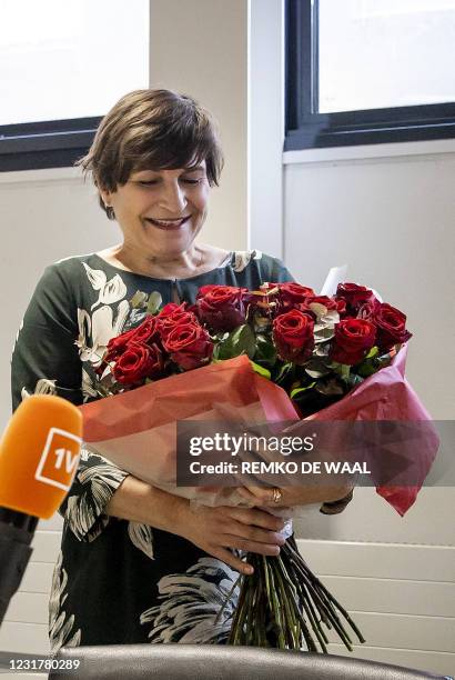 Partij van de Arbeid party leader Lilianne Ploumen holds a bouquet of roses at the Binnenhof, the day after the House of Representatives elections in...