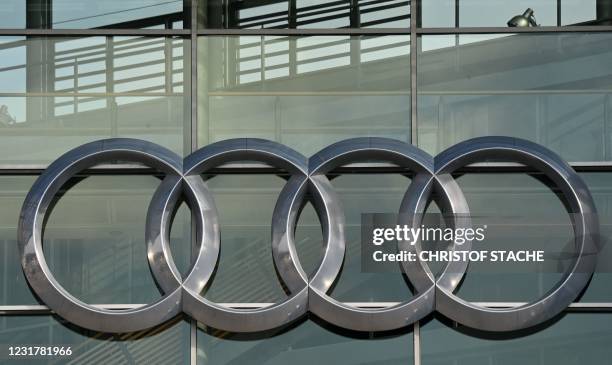 The logo of the German carmaker Audi is seen on March 18, 2021 at their headquarters in Ingolstadt, southern Germany, as the company presents its...