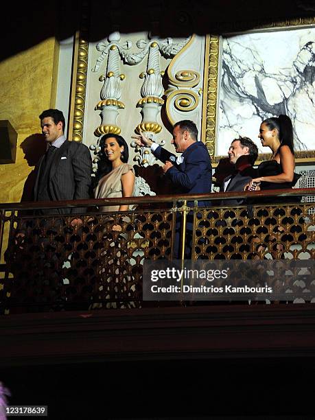 Player Kris Humphries, Kim Kardashian, Colin Cowie, Jason Binn and Kourtney Kardashian attend A Night of Style & Glamour to welcome newlyweds Kim...