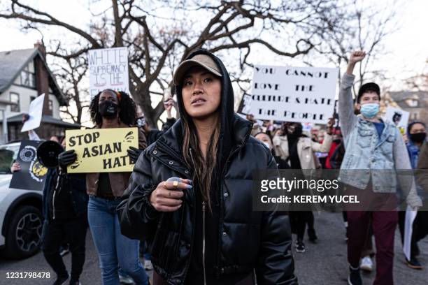 Anthea Yur leads protesters in chants during the "Asian Solidarity March" rally against anti-Asian hate in response to recent anti-Asian crime on...