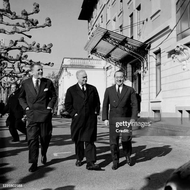 The head of the French delegation and Minister of State for Algerian Affairs Louis Joxe surrounded by Robert Buron , Minister of Public Works and...
