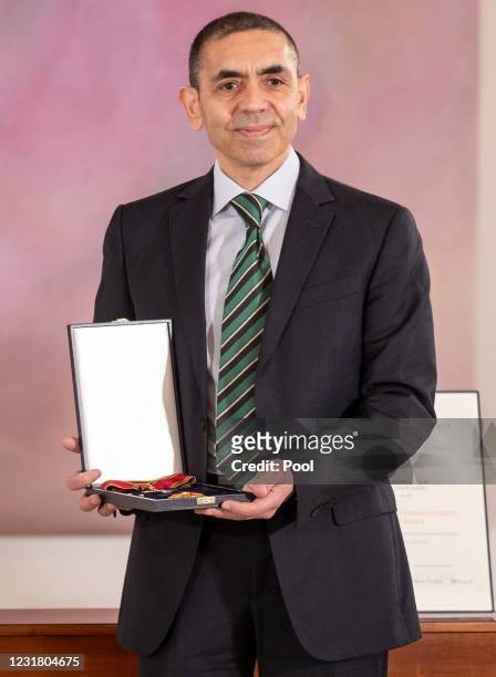Ugur Sahin, Co-founder of Biontech SE, poses after receiving the Federal Order Of Merit President Frank-Walter Steinmeier at Schloss Bellevue on...