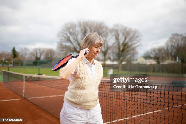 Dortmund, Germany In this photo illustration a 82 years old woman is playing tennis on March 17, 2021 in Dortmund, Germany.