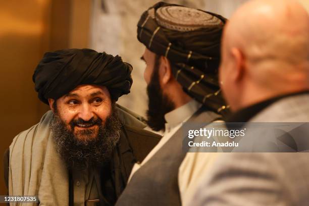 Taliban delegation headed by Abdul Ghani Baradar , the groups deputy leader, are seen leaving the hotel after attending the meeting on Afghan peace...