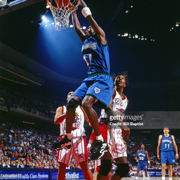 Kevin Garnett of the Minnesota Timberwolves dunks the ball against the Houston Rockets on November 19, 1996 at The Summit in Houston, Texas. NOTE TO...