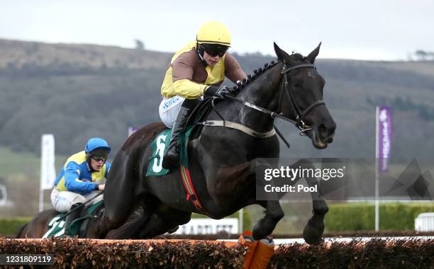 Galopin Des Champs ridden by Sean O'Keeffe jumps the last to win The Martin Pipe Conditional Jockeys' Handicap Hurdle during day four of the...