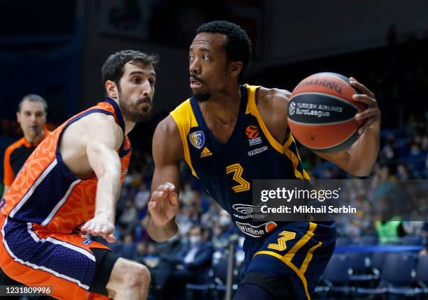 Errick McCollum, #3 of Khimki Moscow Region competes with Guillem Vives, #16 of Valencia Basket during the 2020/2021 Turkish Airlines EuroLeague...