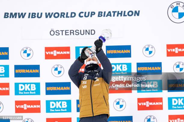 Johannes Thingnes Boe of Norway with the globe of the sprint score during the Men 10 km Sprint Competition at the IBU World Championships Biathlon...