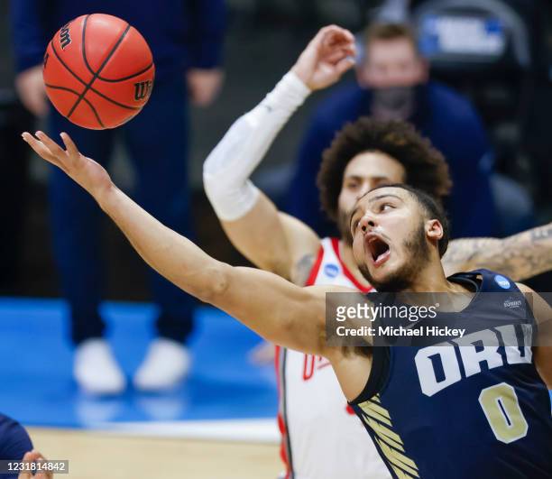 Kevin Obanor of the Oral Roberts Golden Eagles reaches for the rebound during the second half against the Ohio State Buckeyes in the first round of...