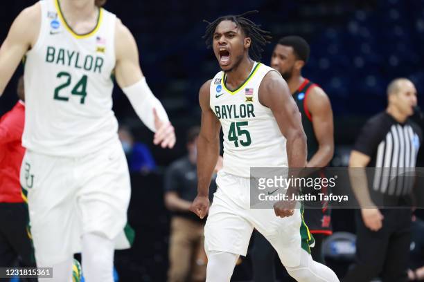 Davion Mitchell of the Baylor Bears reacts to a play against the Hartford Hawks in the first round of the 2021 NCAA Division I Mens Basketball...