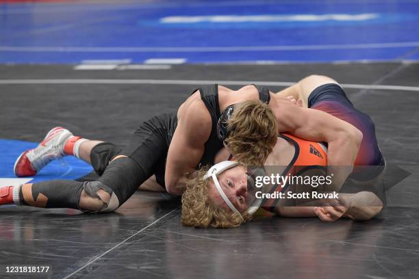 Shane Griffith of the Stanford Carinal wrestles Zach Hartman of the Bucknell Bison in the 165lb weight class during the Division I Mens Wrestling...