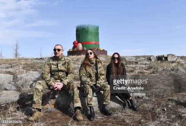 Azerbaijani President Ilham Aliyev , his wife Mehriban Aliyeva and his daughter Leyla Aliyeva pose after Ilham Aliyev ignited the Newroz fire in...