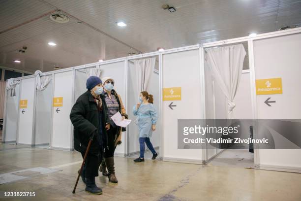 Patients wait to receive a dose of the Oxford-AstraZeneca anti-Covid-19 vaccine on March 20, 2021 in Belgrade, Serbia. Turn out for vaccination...