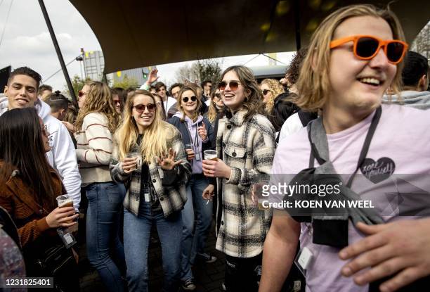 Visitors of a dance festival on the event site of Walibi Holland dance during a performance by Lion Kojo, in Biddinghuizen, Northern Netherlands, on...