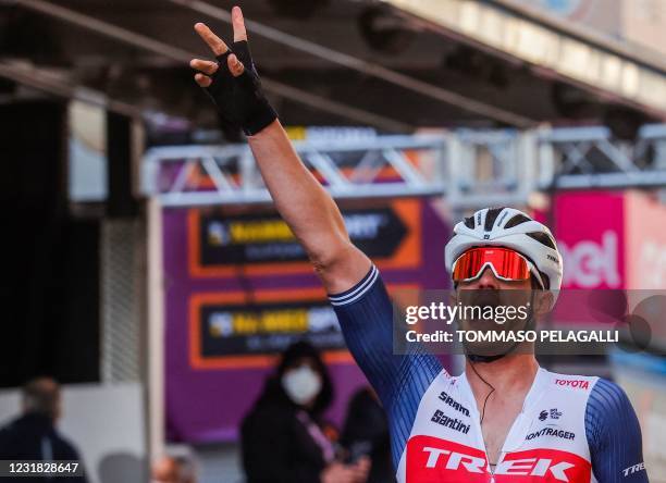 Team Trek rider Belgium's Jasper Stuyven celebrates as he crosses the finish line to win the one-day classic cycling race Milan-San Remo on March 20,...