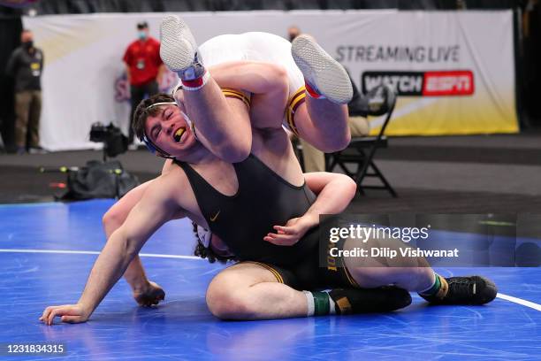 Colton Schultz of Arizona State wrestles Tony Cassioppi of Iowa in the 285lb weight class for third-place during the NCAA Division I Men's Wrestling...