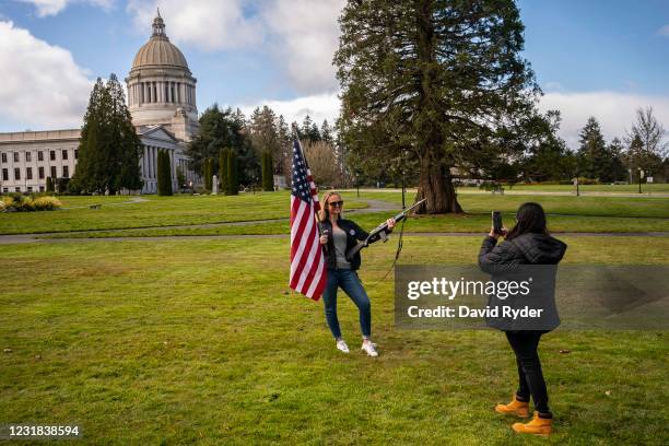 Demonstrators gather for a Second Amendment rally at the Washington State Capitol on March 20, 2021 in Olympia, Washington. The event, billed as a...