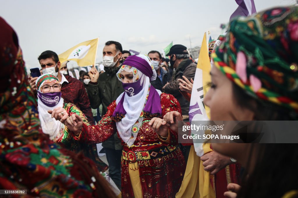 Kurdish women wearing traditional clothes during the...