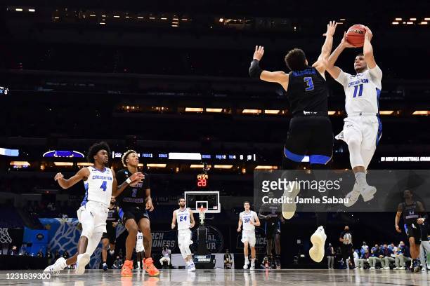 Marcus Zagarowski of the Creighton Bluejays drives to the basket in the first half as JaQuori McLaughlin of the UC Santa Barbara Gauchos defends in...