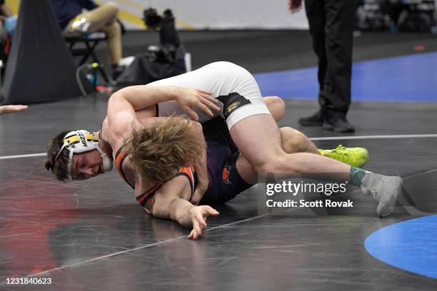 Keegan OToole of the Missouri Tigers wrestles Zach Hartman of the Bucknell Bison in the 165lb weight class during the Division I Mens Wrestling...