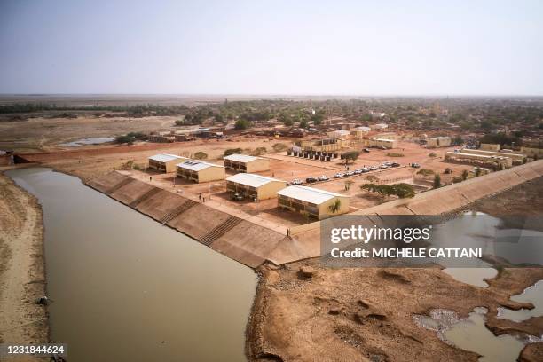 An aerial picture shows the new river port of Konna funded by the World Bank on March 20 as the Malian Prime Minister and his delegation visit the...