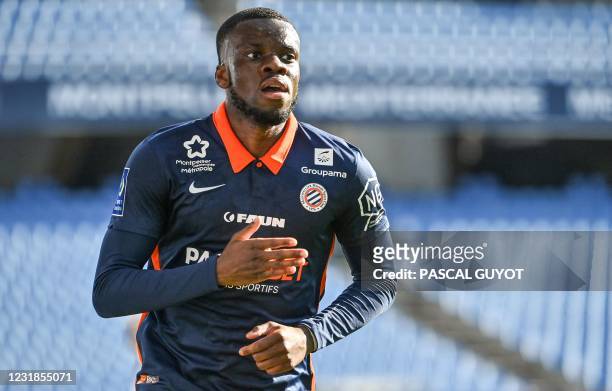 Montpellier's English forward Stephy Mavididi reacts after scoring a goal during the French L1 football match between Montpellier and Bordeaux at the...