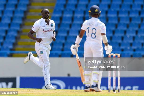 Kemar Roach of West Indies celebrates the dismissal of Pathum Nissanka of Sri Lanka during day 1 of the 1st Test between West Indies and Sri Lanka at...