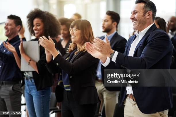 all in attendance, all in agreement - applauding stock pictures, royalty-free photos & images