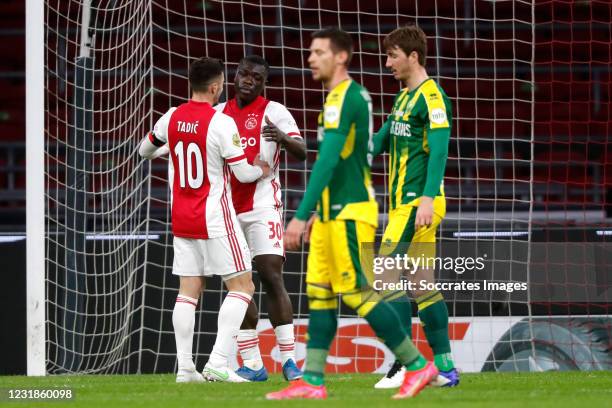 Brian Brobbey of Ajax celebrates 2-0 with Dusan Tadic of Ajax during the Dutch Eredivisie match between Ajax v ADO Den Haag at the Johan Cruijff...