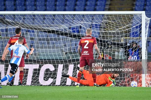 Roma's Spanish goalkeeper Pau Lopez concedes the opening goal during the Italian Serie A football match AS Roma vs Napoli on March 21, 2021 at the...